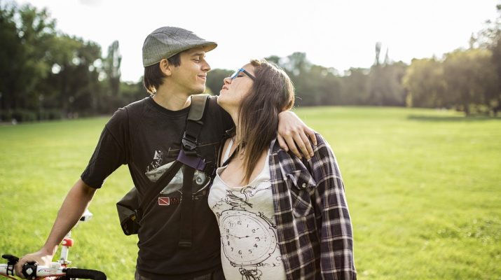 happy couple in park